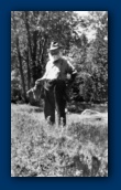 Grandpa Fred Payne McCasland at Northern California cabin with dinner